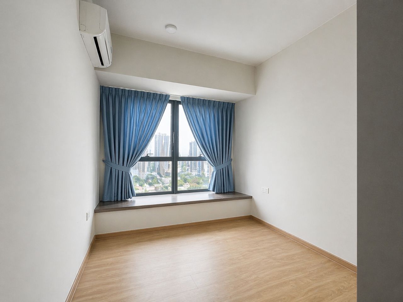 Bedroom with bay window and city view